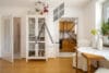 Schöne, gut vermietete Zweizimmerwohnung in Germering mit Tiefgarage und Remise - Blick zur Küche mit Schiebetüre