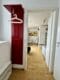 Sonniges und möbiliertes Microappartment mit 25m2 Wohnfläche plus 18 m2 Dachterrasse nähe BMW - Dielenbereich und Übergang Living
